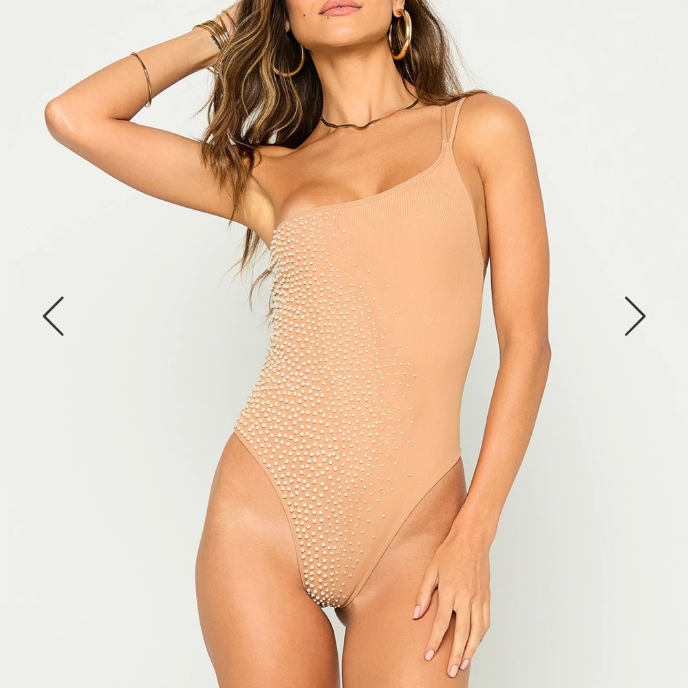 Never worn. Price tags still attached